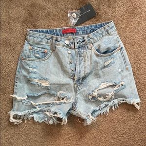 High waisted distressed jean shorts